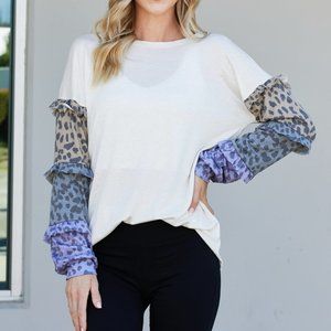 Heimish Full Size Animal Print Ruffle Trim Top
